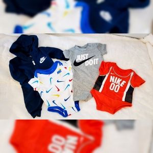 4 NB Baby Nike Onesies